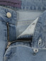 Расклешенные джинсы с декоративной отделкой из кристаллов Emanuel Ungaro  –  Деталь